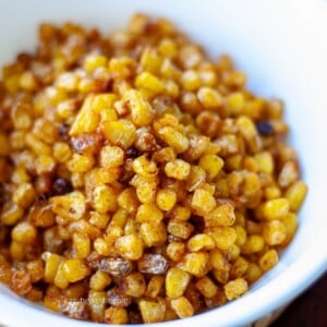 yellow roasted sweet corn in white bowl