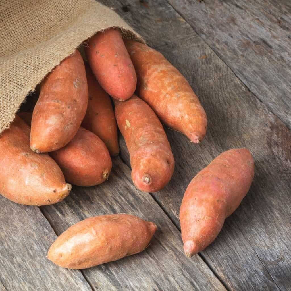 sweet potatoes and burlap bag