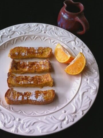 French toast sticks on white plate