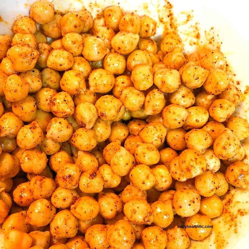 coated chickpeas ready for roasting