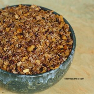 blueberry granola in green bowl