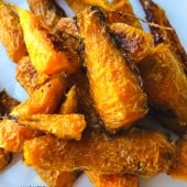 roasted baby carrots in white bowl