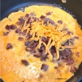 egg, cheese and sausage mixture in skillet