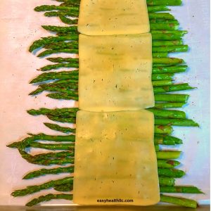 roasted asparagus with cheese slices