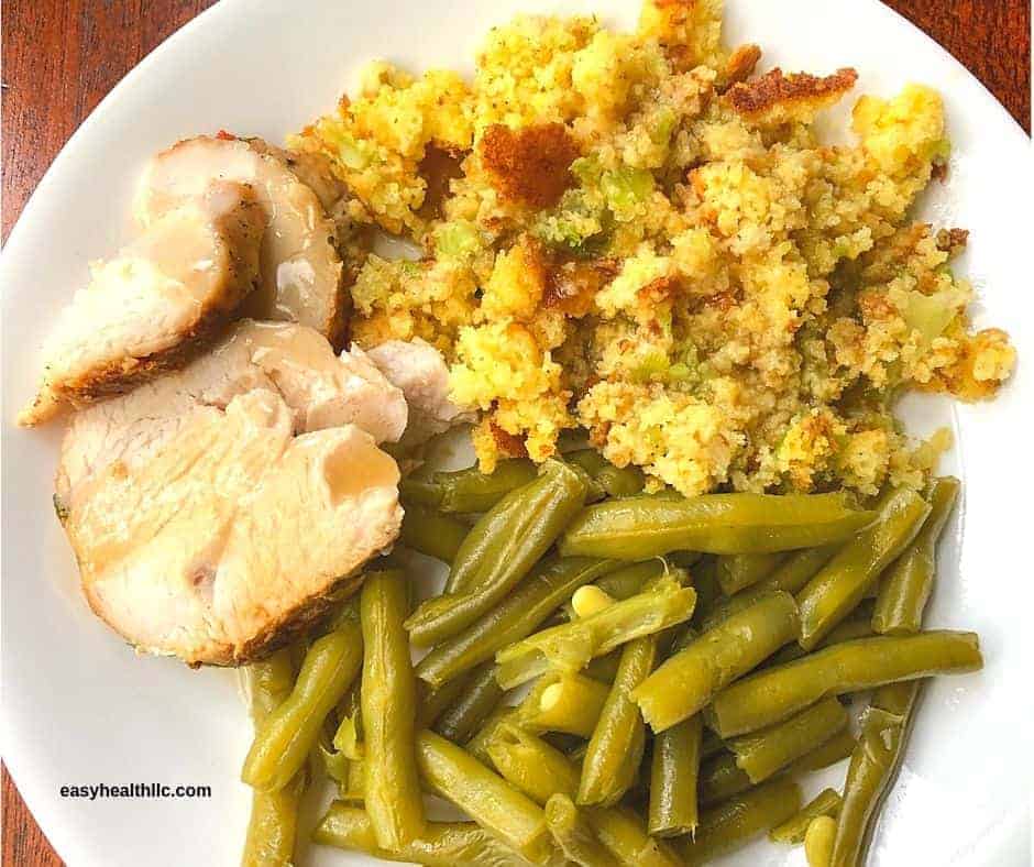 plate of cornbread dressing and turkey