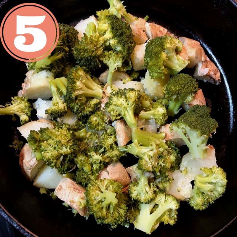 broccoli and baked potato in skillet