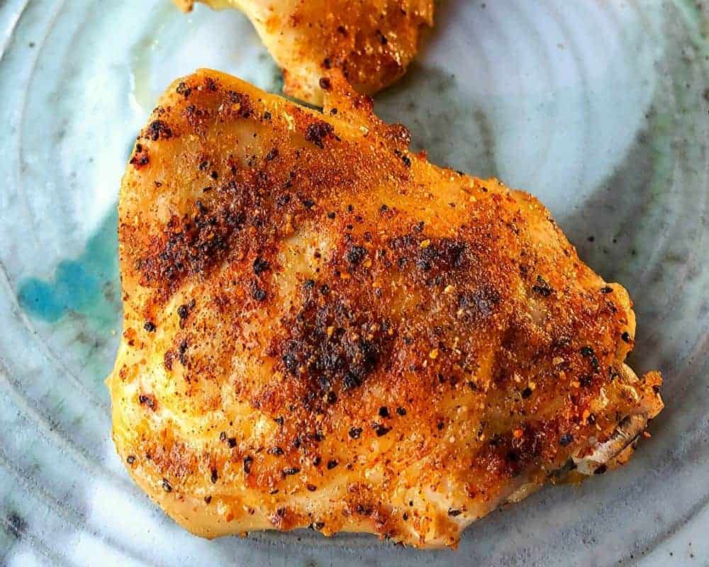 A close up of a piece of rotisserie chicken
