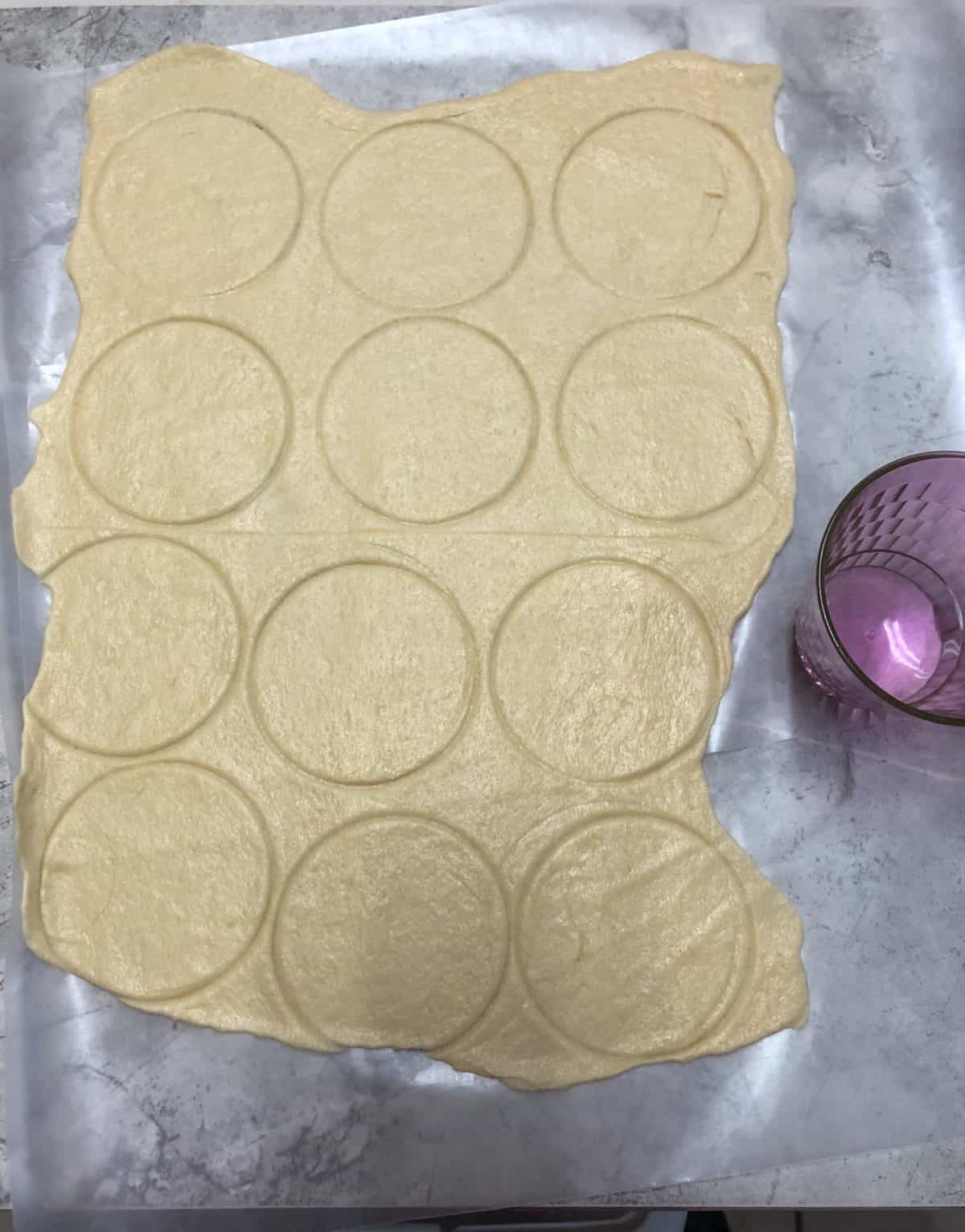 crescent roll dough with circles cut