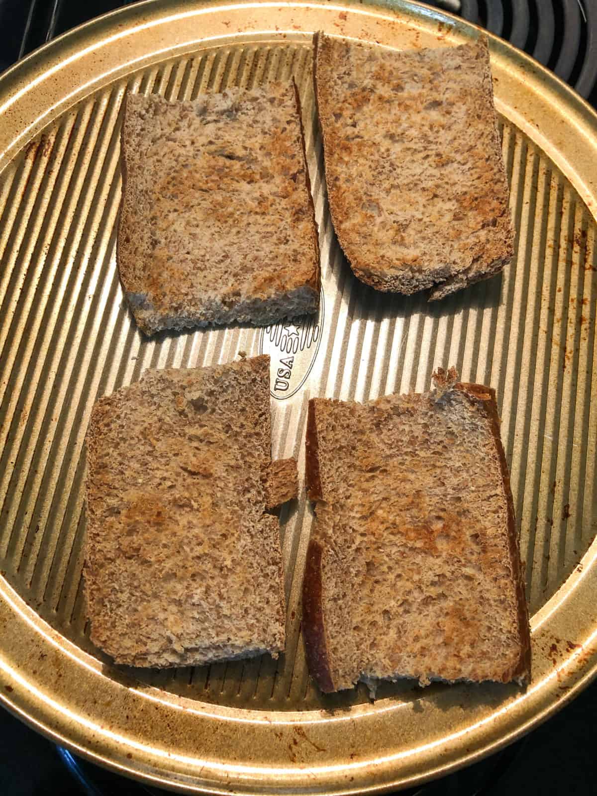 toasted bread on baking sheet