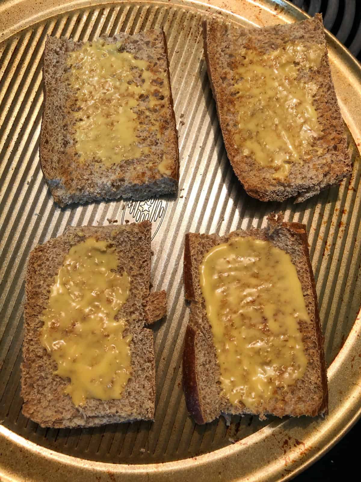 toasted bread with honey mustard spread on top