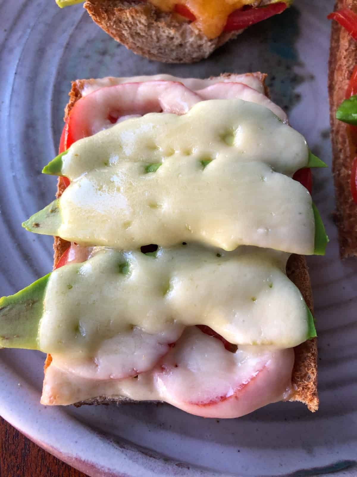 avocado tomato toast on platter
