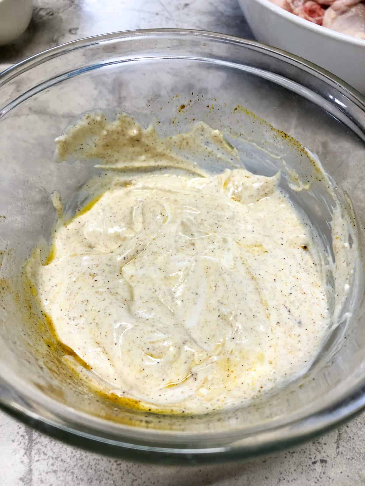 greek yogurt marinade in clear bowl