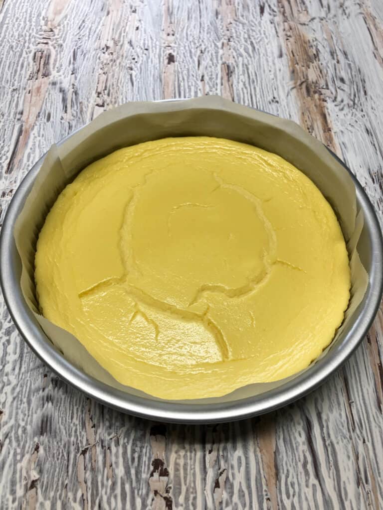 cooked cheesecake in pan