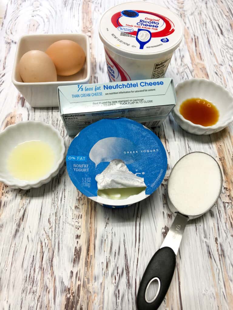 cheeses, eggs,sugar and vanilla in measuring cup