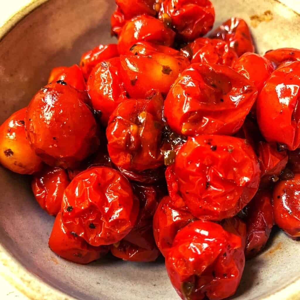 closeup roasted red cherry tomatoes