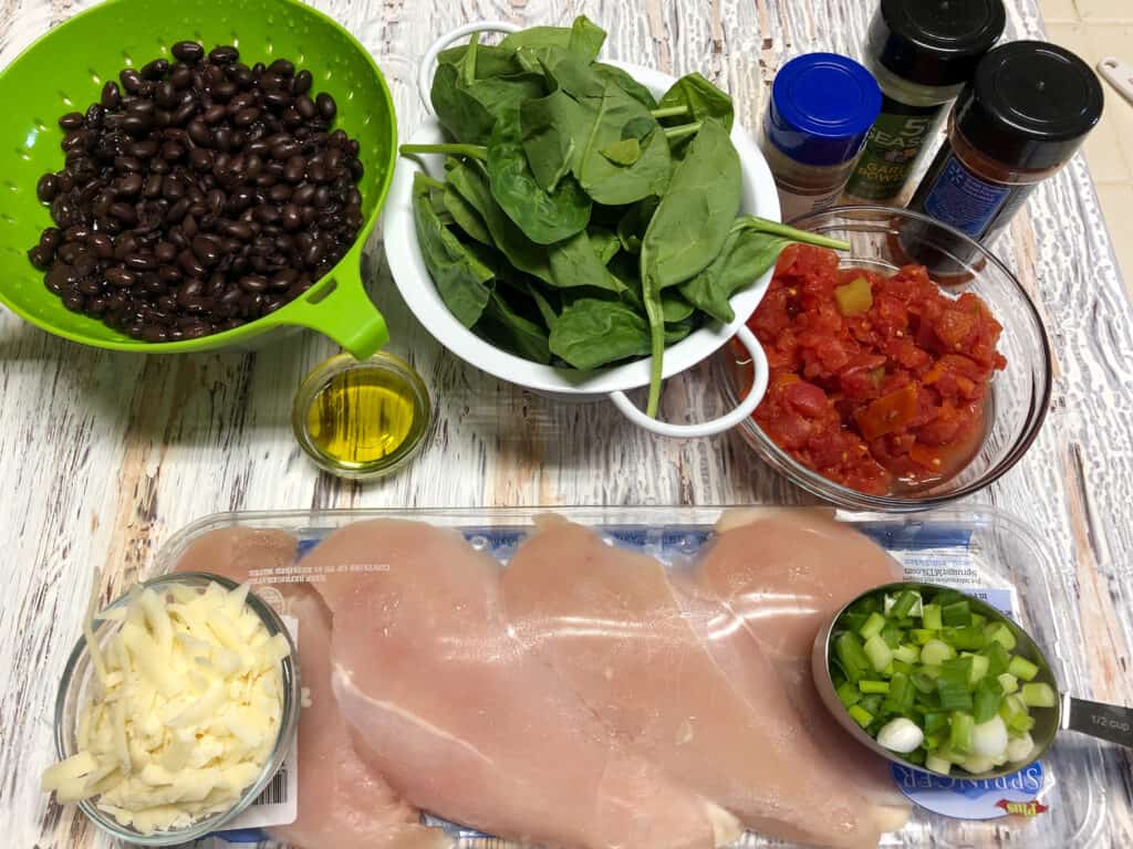 raw chicken, spinach, seasonings,cheese and black beans