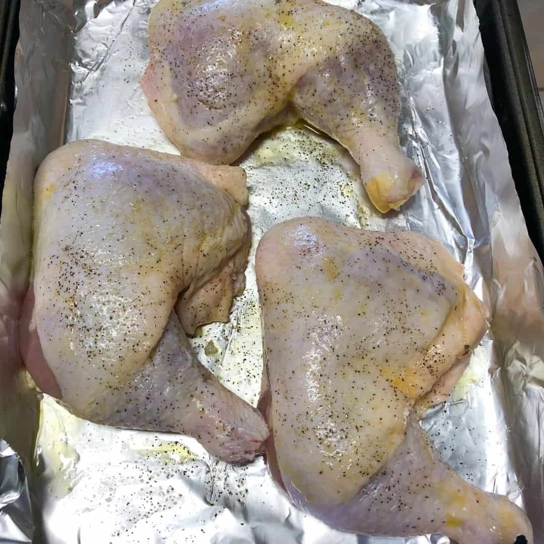 raw chicken on pan
