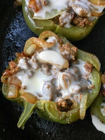 bell pepper half filled with beef and melted cheese