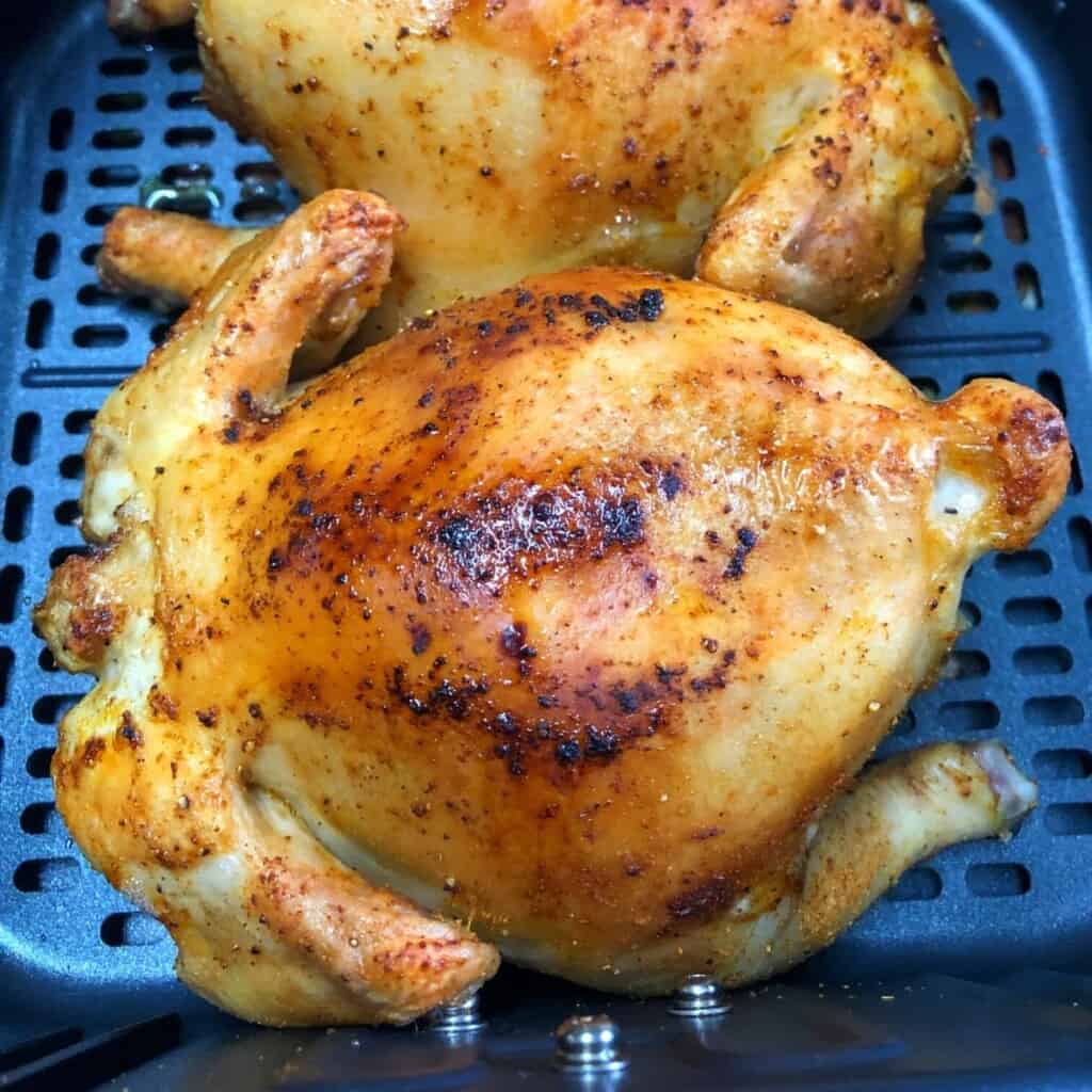 cooked cornish hen back side up in air fryer