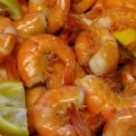 boiled shrimp with lemon wedges