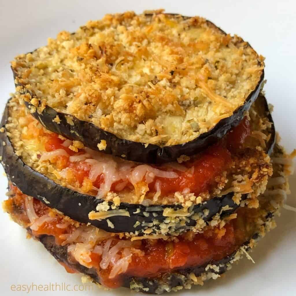 baked eggplant slices layered with tomato sauce