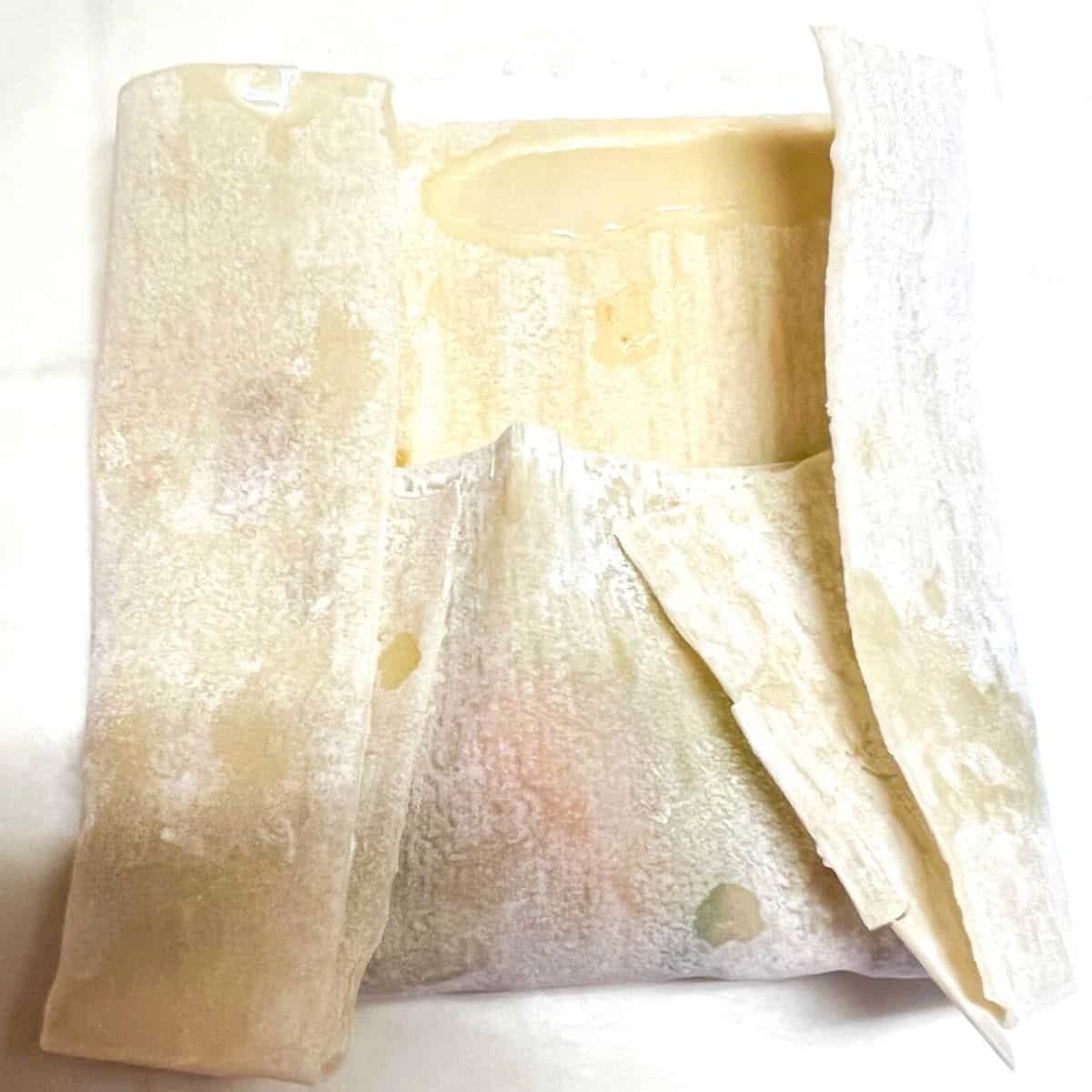egg roll with bottom and sides folded