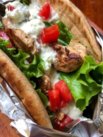 pita stuffed with lettuce, tomatoes and greek chicken