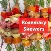 Rosemary skewers with veggies and sausages.