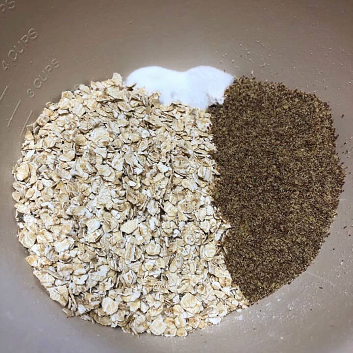 oats, flax and seasonings in metal bowl