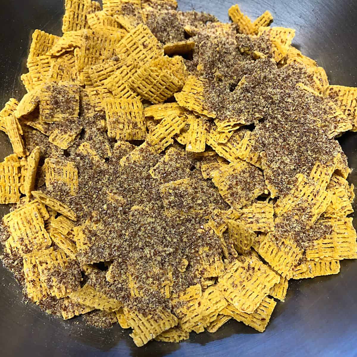 cereal and flaxseed in mixing bowl