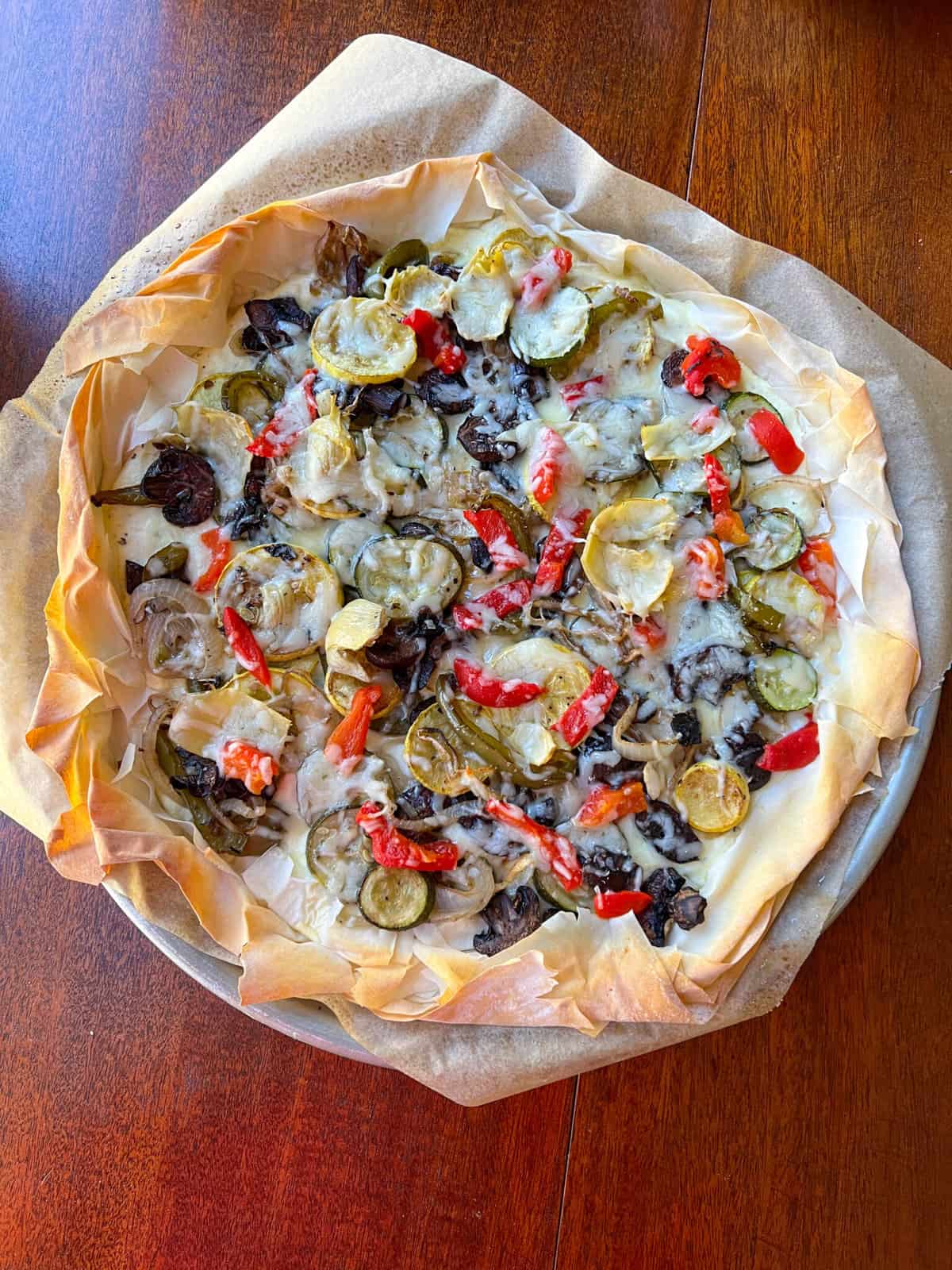 phyllo pizza on wooden table
