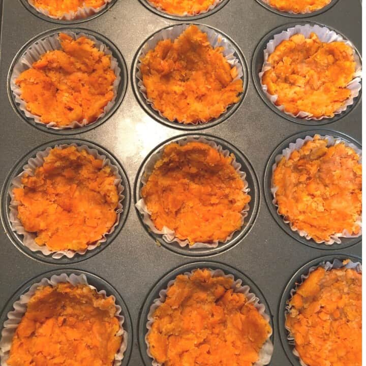 baked, mashed sweet potato tot crust in muffin tin