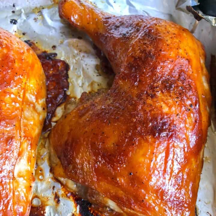 bbq chicken leg and thigh on foil
