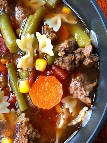 green beans, hamburger, carrots,corn soup in pot