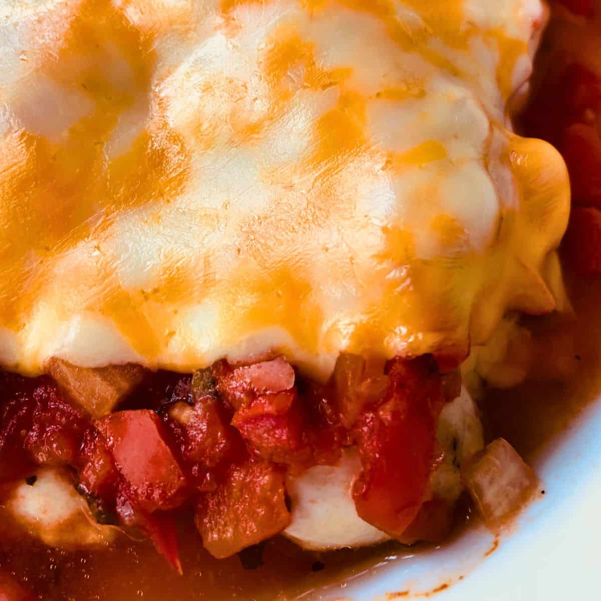 chicken tenders covered in salsa and melted cheese