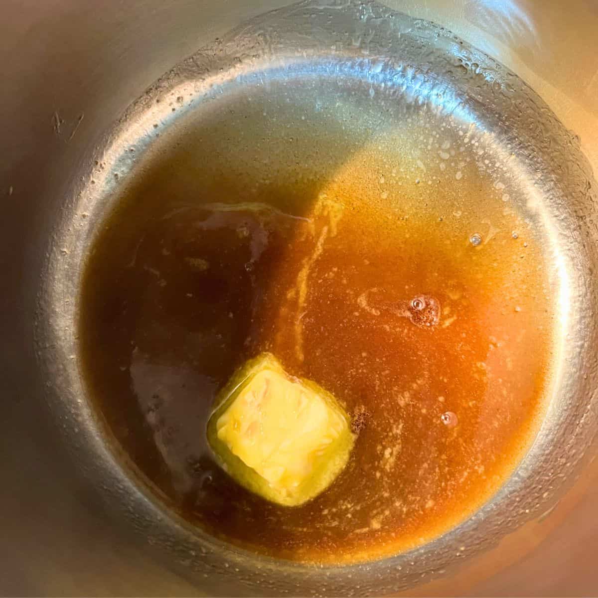Sauce ingredients in pan for green beans in a can recipe.