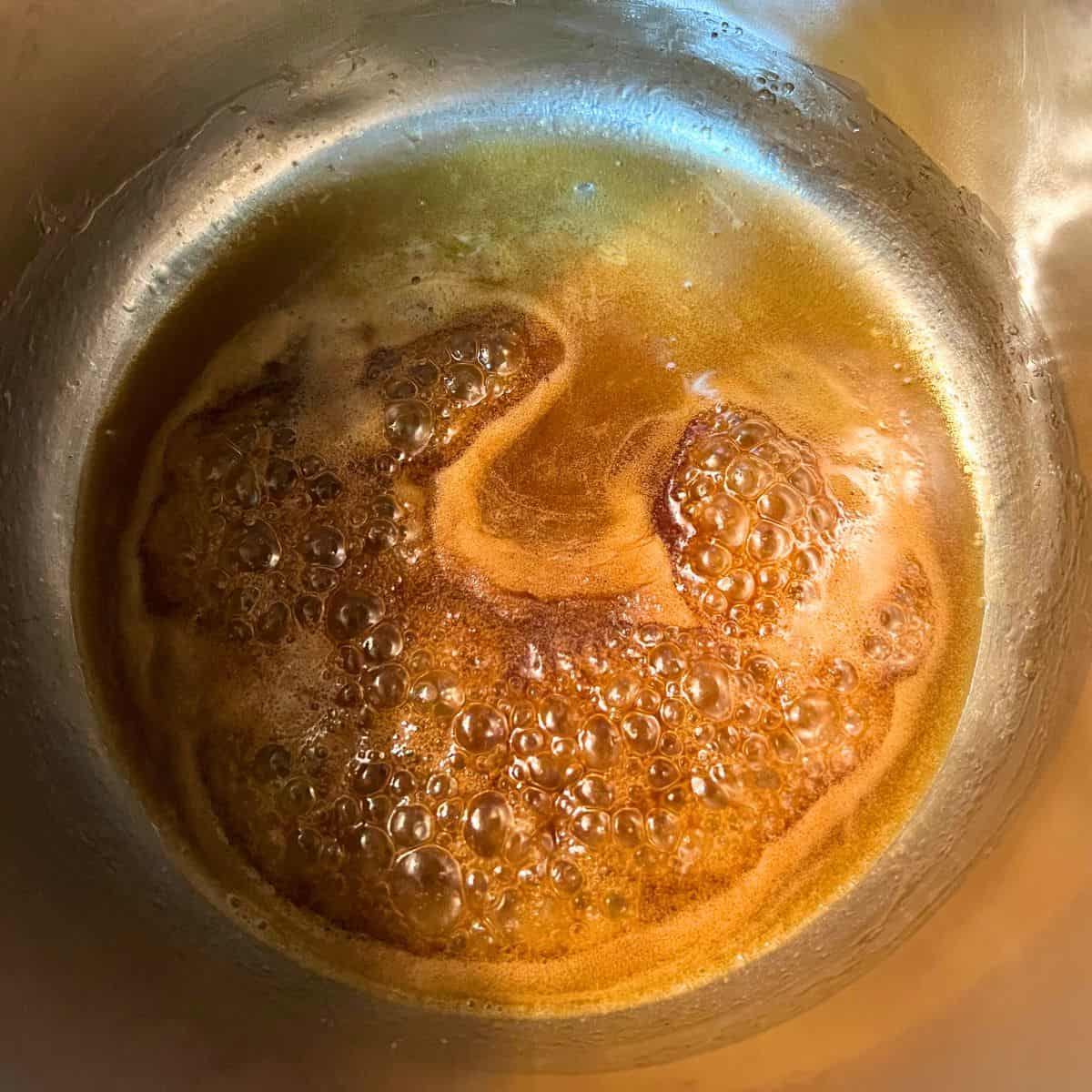 Simmering sauce for green beans in a can recipe.