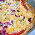 Tomato pie in crust with cheese and tomatoes