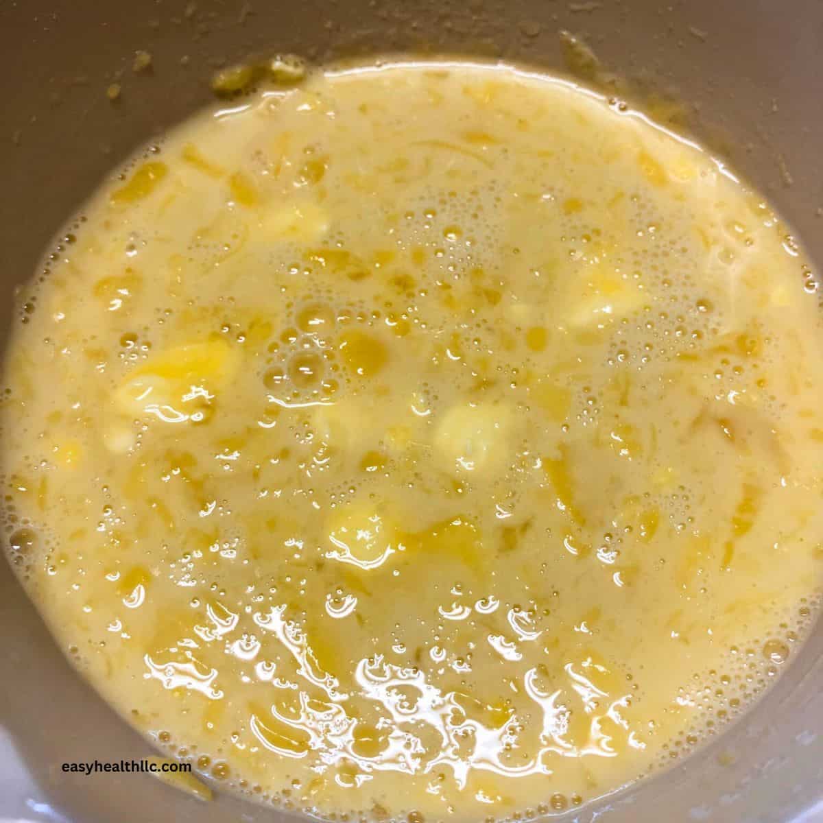 Coconut pie ingredients in mixing bowl.