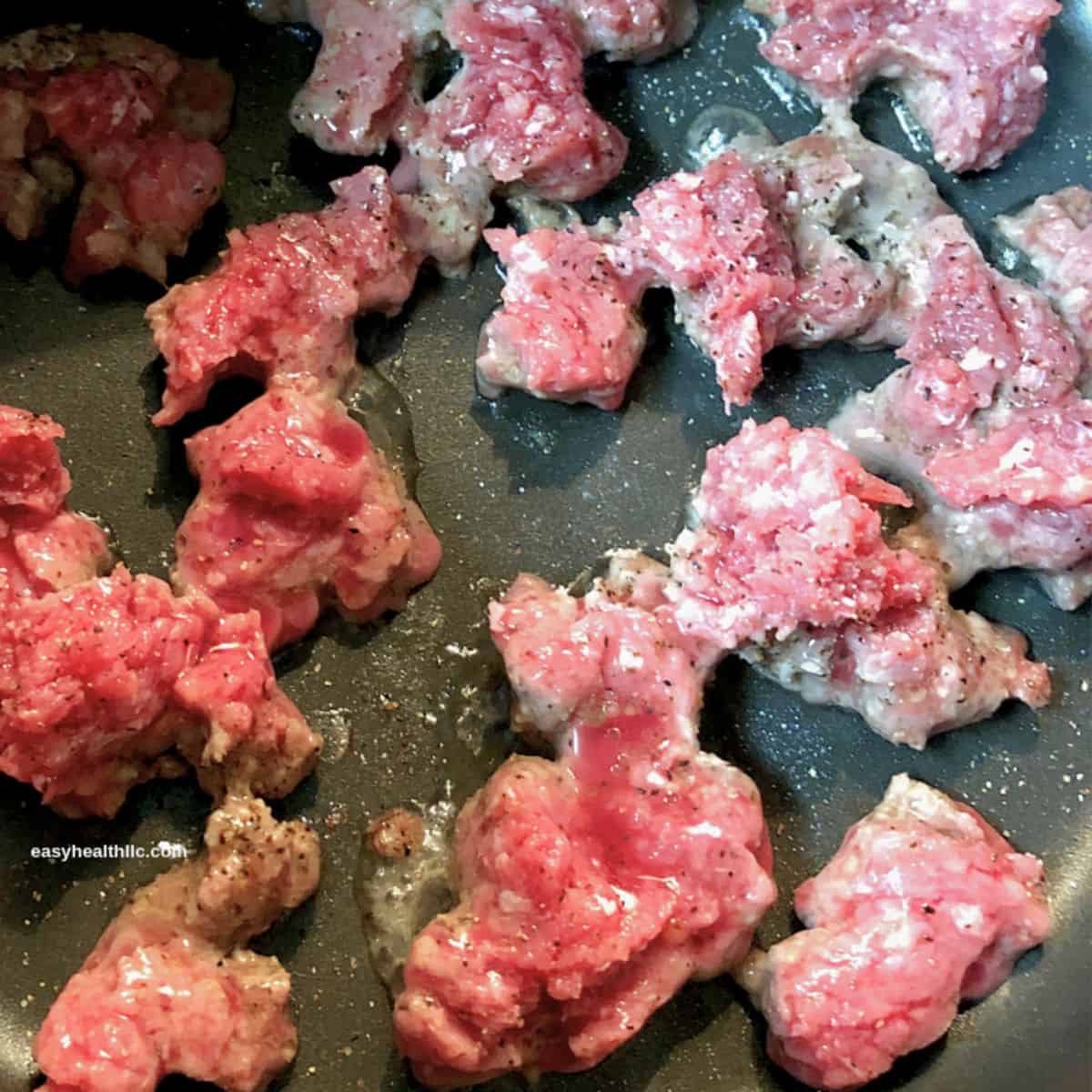 ground beef browning in skillet