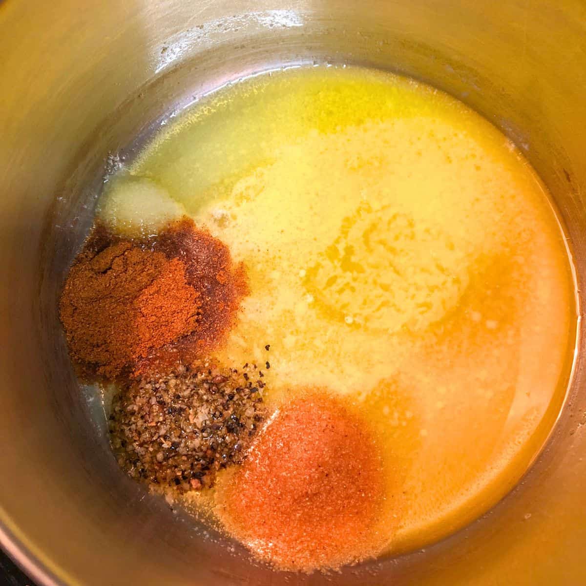 Butter and seasonings in a bowl for baked salmon