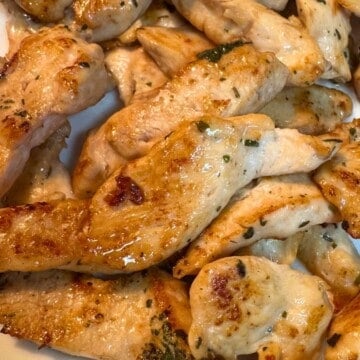 high protein Greek chicken tenders on serving plate
