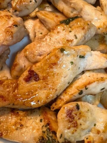 high protein Greek chicken tenders on serving plate