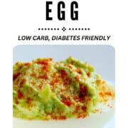 avocado stuffed egg half with text